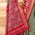Green ethnic motifs woven design zari patola saree
