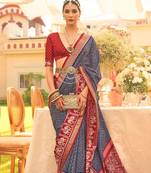 Navy blue ethnic printed zari patola saree