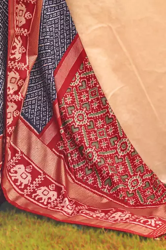 Navy blue ethnic printed zari patola saree