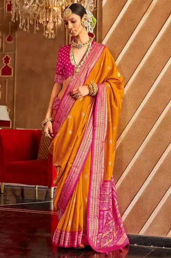 Orange ethnic motifs zari patola saree