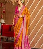 Orange ethnic motifs zari patola saree