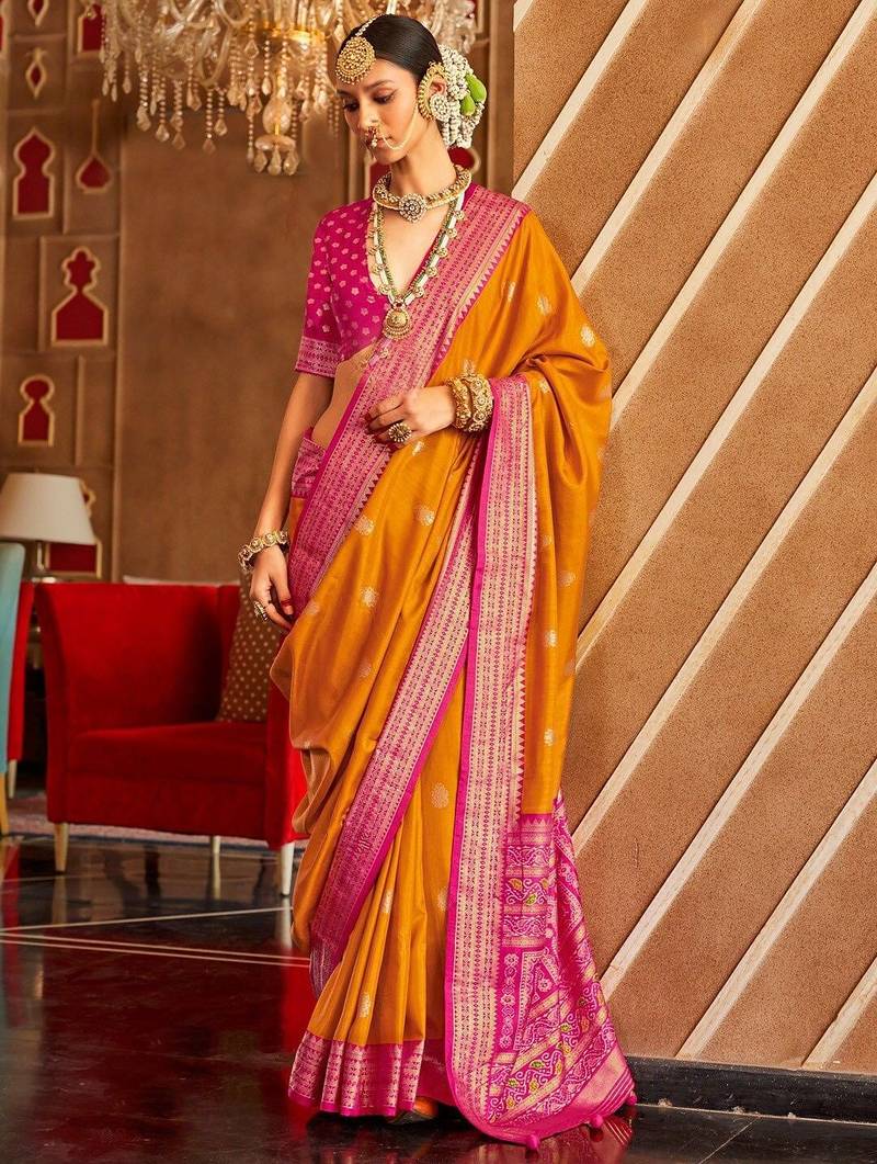 Orange ethnic motifs zari patola saree