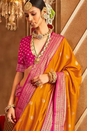 Orange ethnic motifs zari patola saree