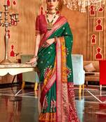Green woven design zari patola saree