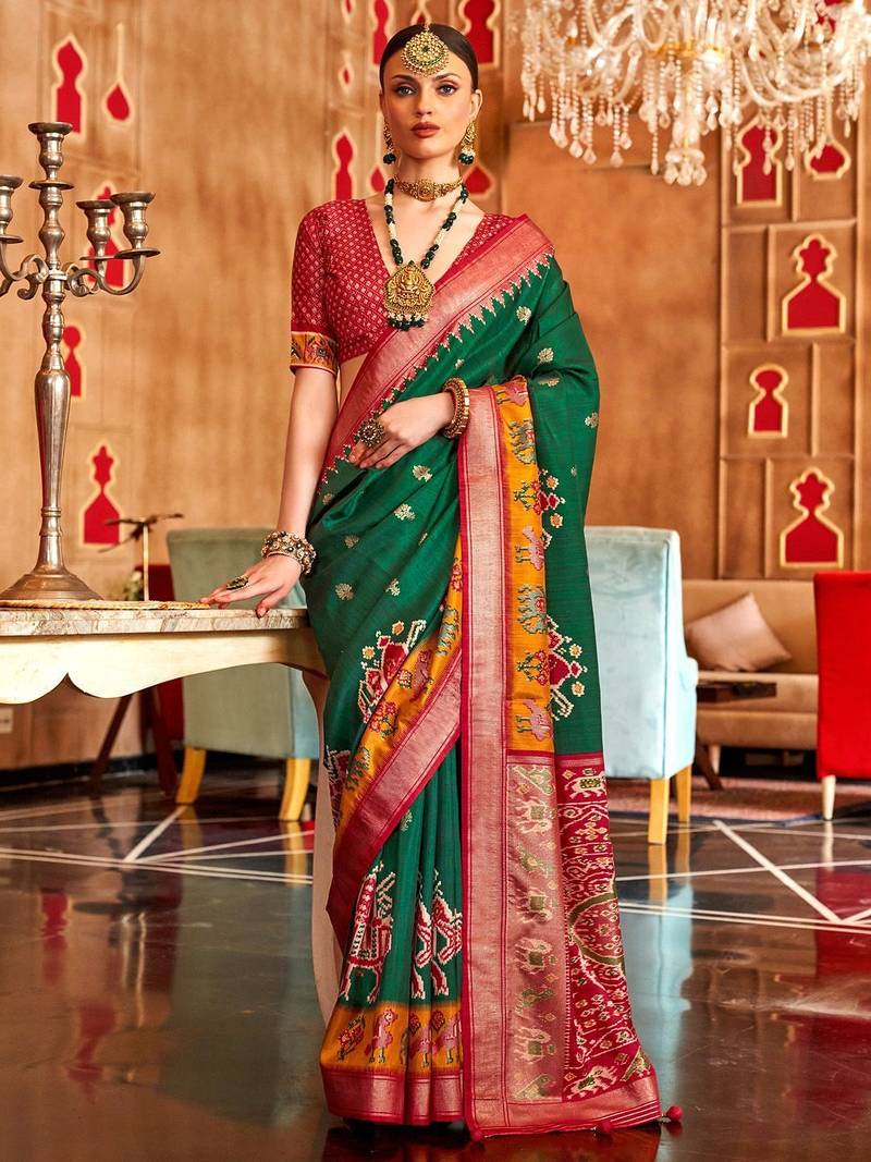 Green woven design zari patola saree