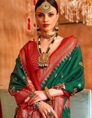 Green woven design zari patola saree 2