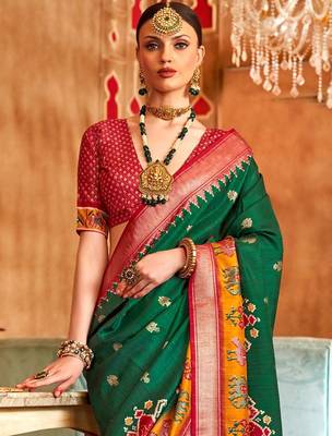 Green woven design zari patola saree 3