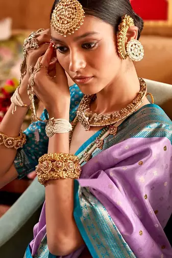 Lavender ethnic motifs zari patola saree