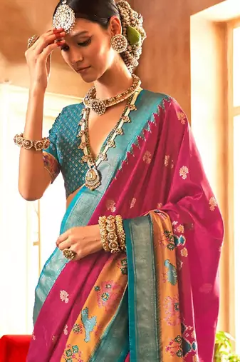 Pink woven design ethnic motifs zari patola saree