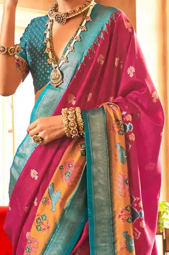 Pink woven design ethnic motifs zari patola saree
