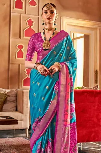 Blue ethnic motifs woven design zari  patola saree