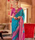 Blue ethnic motifs woven design zari  patola saree