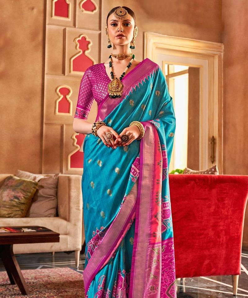 Blue ethnic motifs woven design zari  patola saree