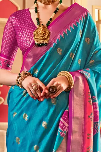 Blue ethnic motifs woven design zari  patola saree