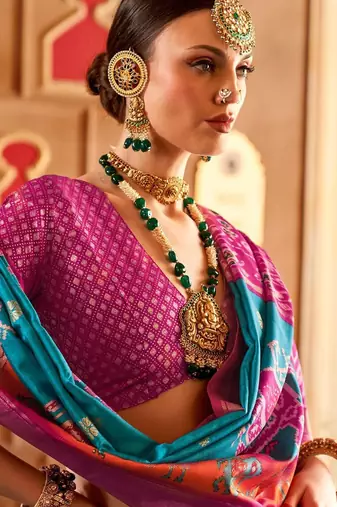 Blue ethnic motifs woven design zari  patola saree