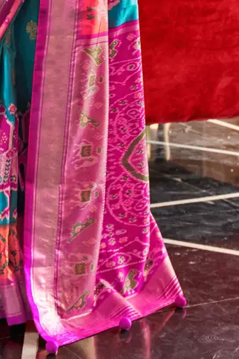 Blue ethnic motifs woven design zari  patola saree