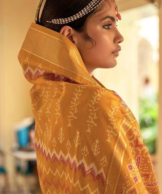 Mustard geometric silk blend ikat saree 2