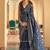 Navy blue ethnic motifs printed ikat saree