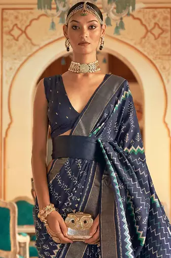 Navy blue ethnic motifs printed ikat saree