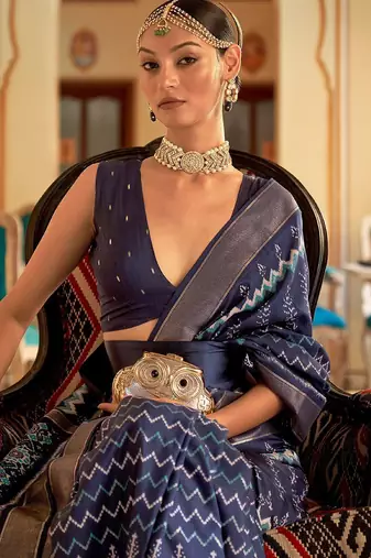 Navy blue ethnic motifs printed ikat saree