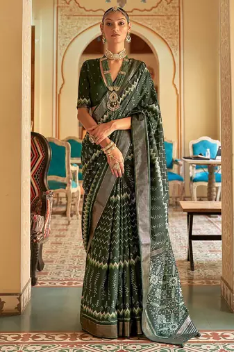 Green ethnic motif printed zari ikat saree