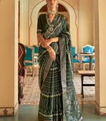 Green ethnic motif printed zari ikat saree