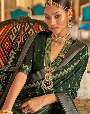 Green ethnic motif printed zari ikat saree 2
