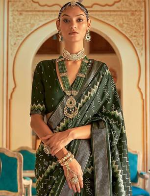 Green ethnic motif printed zari ikat saree 3