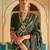 Green ethnic motif printed zari ikat saree