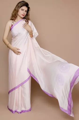 cream ethnic motifs printed satin saree