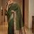 Green woven design zari silk blend designer banarasi saree