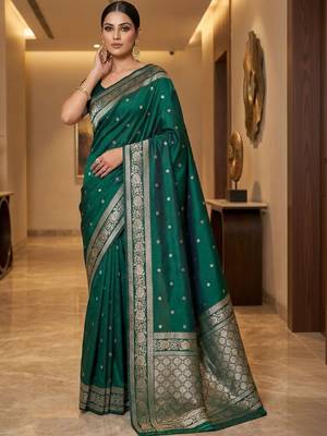 Green woven design zari silk blend designer banarasi saree 1