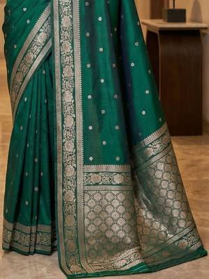 Green woven design zari silk blend designer banarasi saree 3