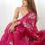 pink ethnic motifs sequinned organza saree