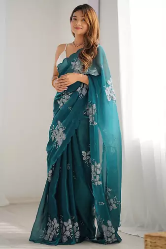 teal ethnic motifs sequinned organza saree