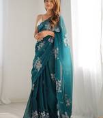 teal ethnic motifs sequinned organza saree