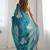 teal ethnic motifs sequinned organza saree