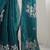 teal ethnic motifs sequinned organza saree