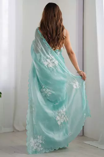 blue ethnic motifs sequinned saree
