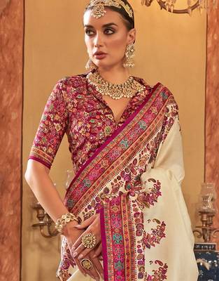 Cream ethnic motifs printed saree 1