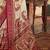 Cream ethnic motifs printed saree