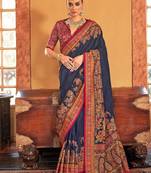 blue ethnic motifs printed banarasi silk blend saree