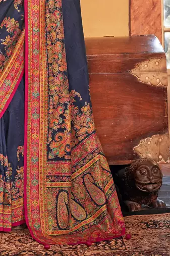 blue ethnic motifs printed banarasi silk blend saree