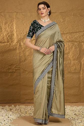 Olive ethnic motifs embroidered silk blend saree with matching blouse