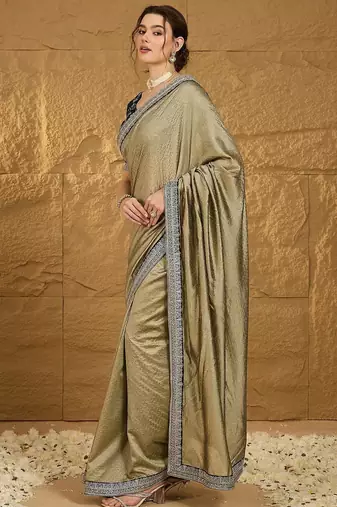 Olive ethnic motifs embroidered silk blend saree with matching blouse