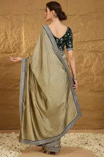 Olive ethnic motifs embroidered silk blend saree with matching blouse
