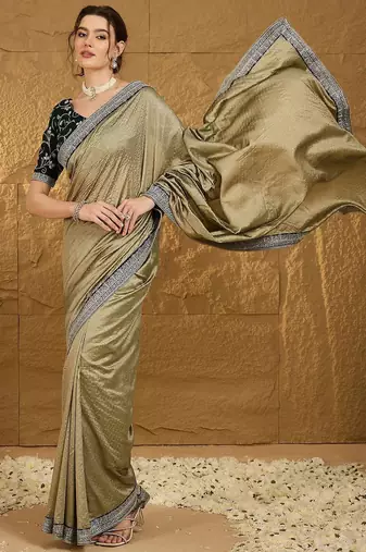 Olive ethnic motifs embroidered silk blend saree with matching blouse