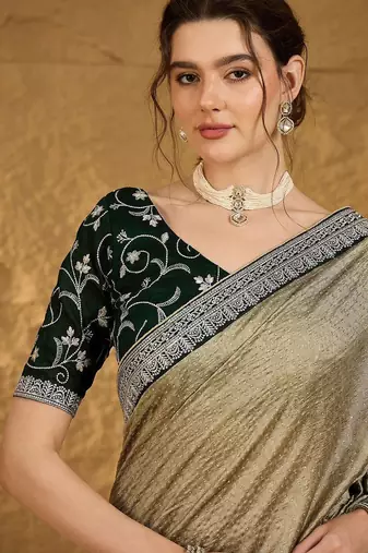 Olive ethnic motifs embroidered silk blend saree with matching blouse