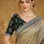 Olive ethnic motifs embroidered silk blend saree with matching blouse