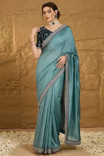 Teal embellished embroidered party wear saree